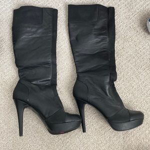 Black knee high boots.